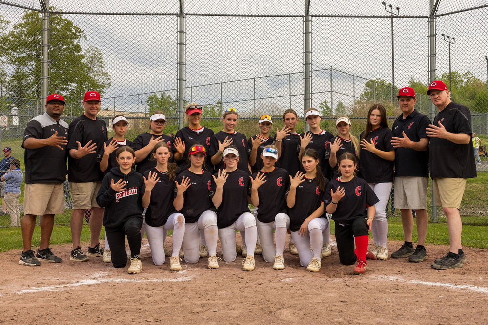 Chatham Panthers Softball team making five sign with hands